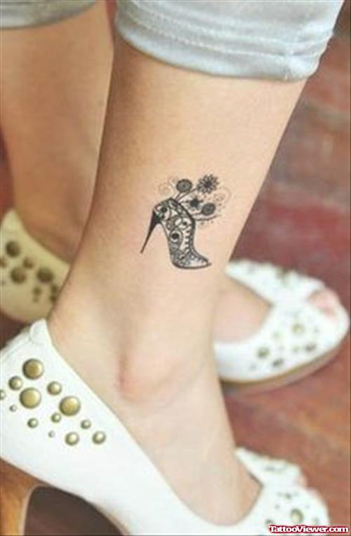 Grey Ink Heel Tattoo For Girls