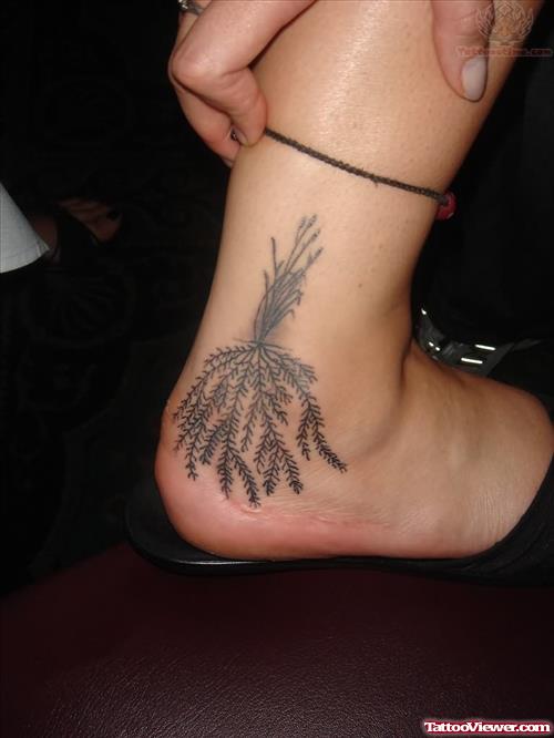 Grey Ink Plant Heel Tattoo