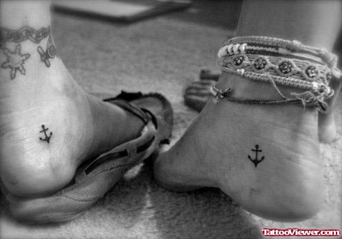 Tiny Black Anchors Heel Tattoos