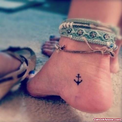 Black Ink Tiny anchor Heel Tattoo