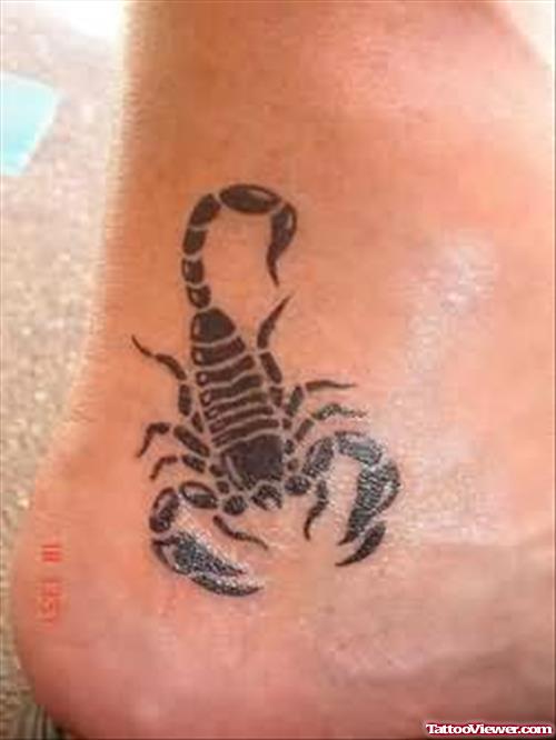 Black Ink Scorpio Heel Tattoo