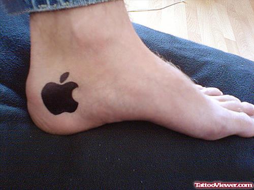 Black Ink Apple Logo Heel Tattoo