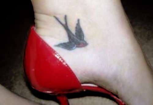 Flying Bird Heel Tattoo For Girls