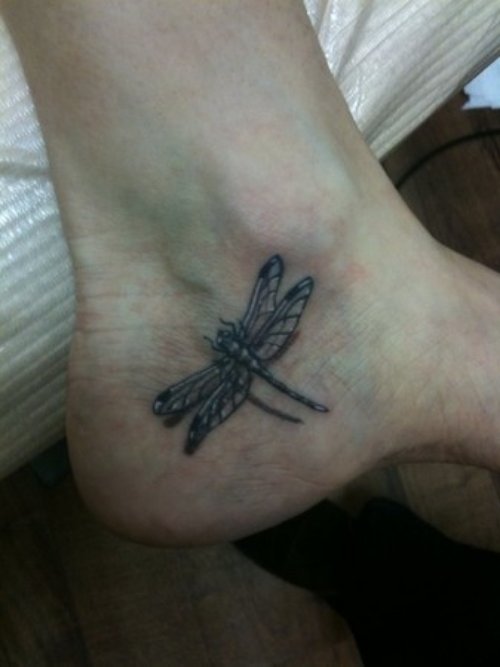 Grey Ink Dragonfly Heel Tattoo