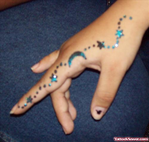 Blue Ink Glitter Henna Tattoo On Hand