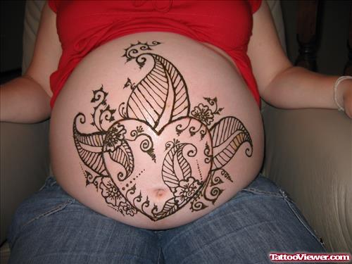 Attractive Henna Tattoo On Girl Belly