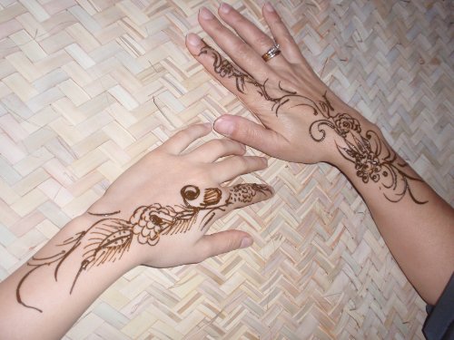 Classic Henna Tattoos On Back Hands