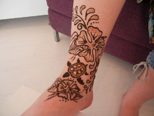 Flower And Turtle Henna Tattoo On Leg