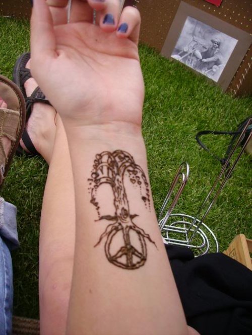 Peace Symbol and Tree Henna Tattoo on Left Forearm