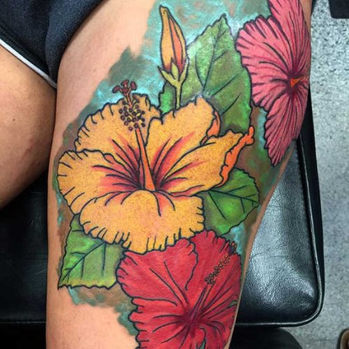 Colorful Hibiscus Flowers Tattoo On Left Thigh