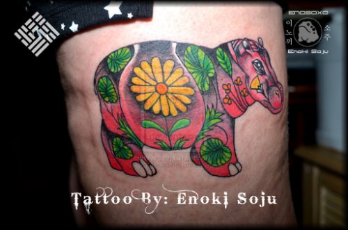 Colored Flowers Hippo Tattoo On Side