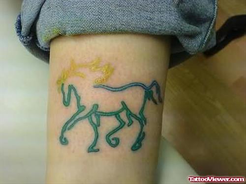 Outlined Horse Tattoo On Arm