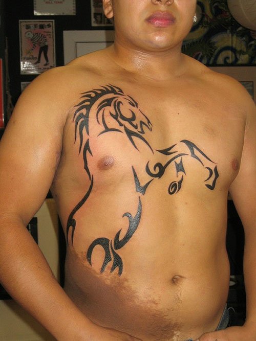 Black Tribal Horse Tattoo On Man Chest