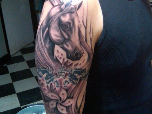 Grey Ink Flowers And Horse Tattoo On Half Sleeve