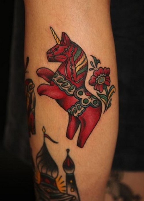 Red Ink Horse Tattoo On Leg