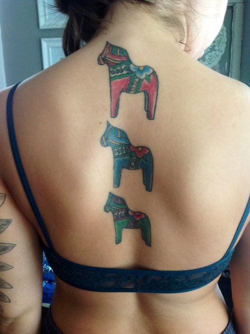 Colored Horse Tattoos on Girl Back
