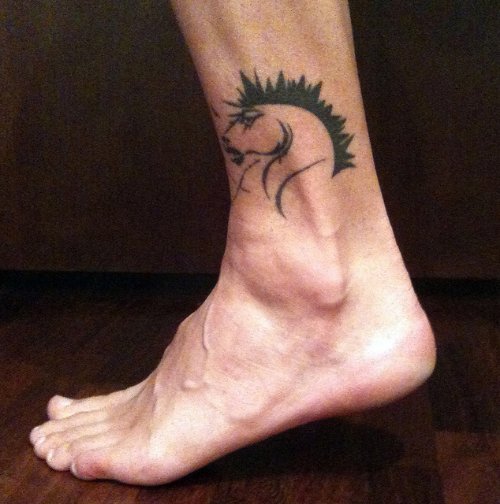 Black Ink Horse Head Tattoo On Left Ankle