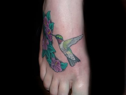 Color Flowers And Hummingbird Tattoo On Right Foot