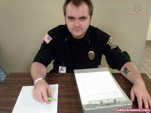 Icp Tattoo On Policeman Arm