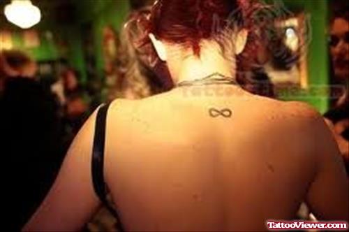 Infinity Symbol Tattoo On Upper Back