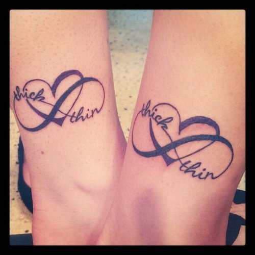 Matching Heart And Infinity Tattoo On Legs