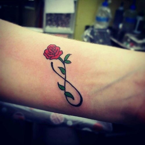 Red Rose Flower Bud Infinity Tattoo On Forearm