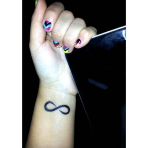 Attractive Infinity Tattoo On Girl Left Wrist