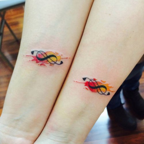 colorful Musical Infinity Matching tattoo On Forearms