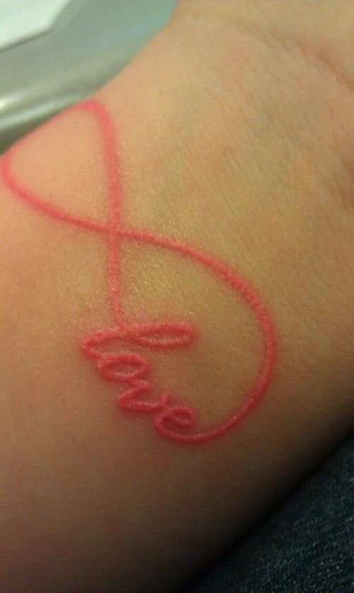 Red Ink Love Infinity Tattoo On Forearm