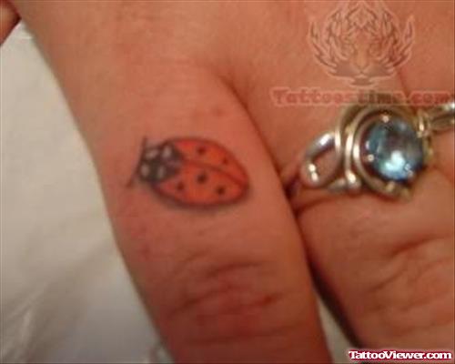 Ladybug Tattoo On Finger