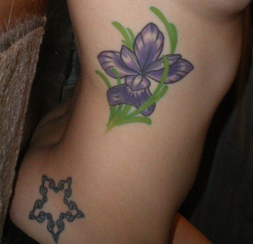 Girl Rib Side Iris Tattoo