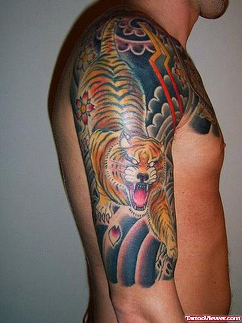 Japanese Tiger Tattoo On Chest And Half Sleeve