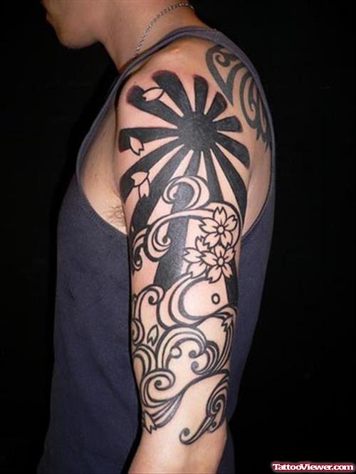 Black Ink Japanese Tattoo On Left Half Sleeve