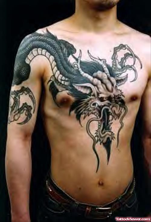 Black Ink Japanese Dragon Tattoo On Man Chest