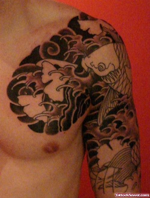 Amazing Grey Ink Japanese Tattoo On Chest And Half Sleeve
