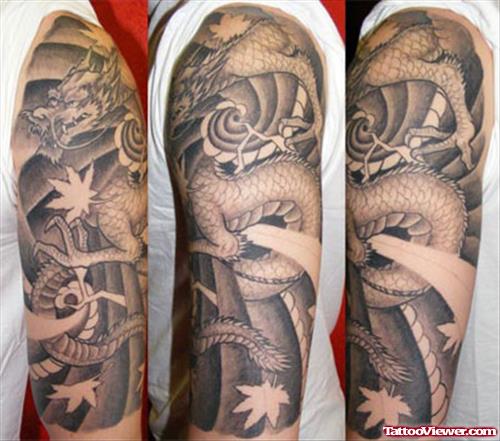 Grey Ink Japanese Dragon Tattoo On Half Sleeve