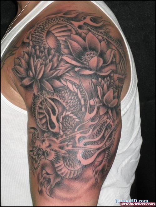 Grey Ink Japanese Dragon And Lotus Flower Tattoo On Half Sleeve