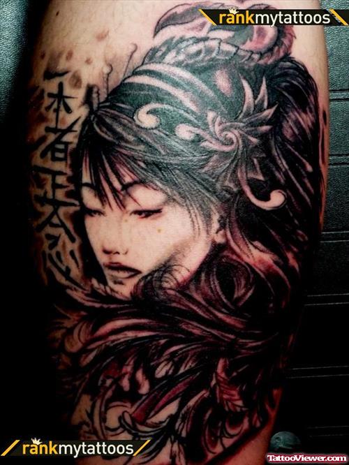 Japanese Symbols And Girl Head Tattoo