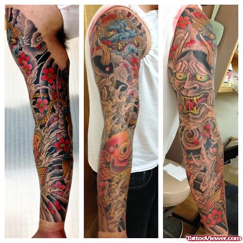 Amazing Colored Japanese Tattoo On Man Full Sleeve