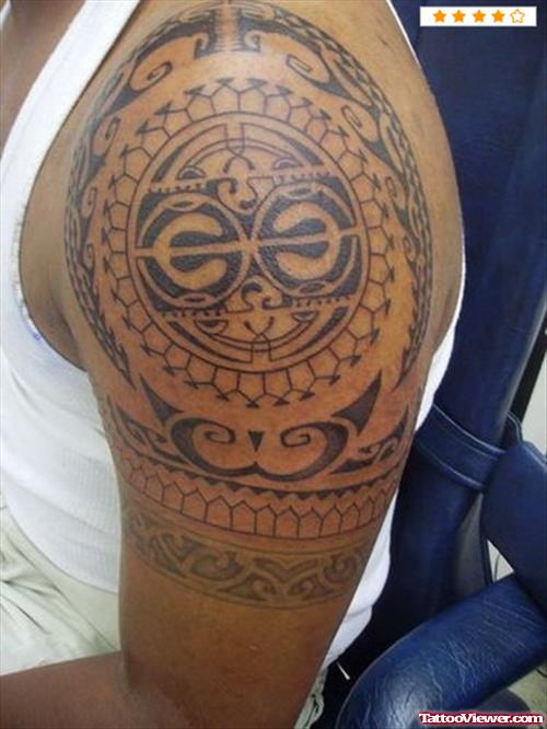 Tribal Japanese Tattoo On Left Shoulder