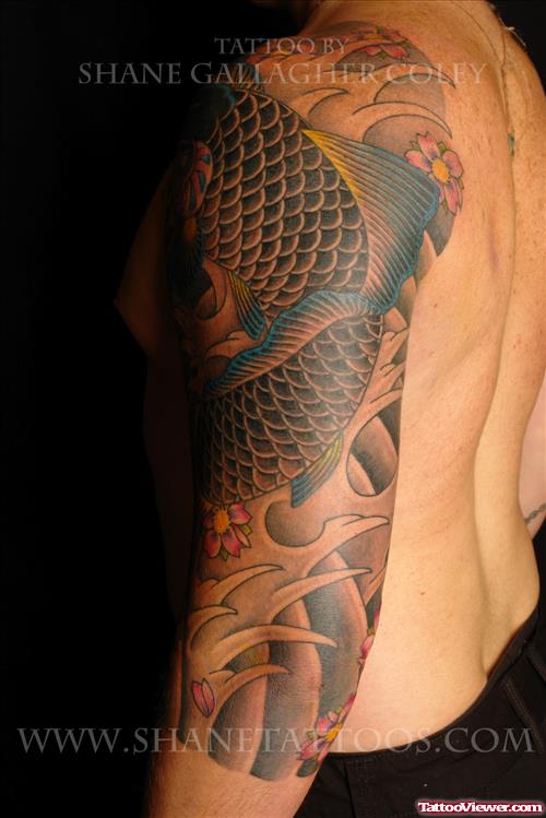 Amazing Japanese Fish Tattoo On Left Half Sleeve