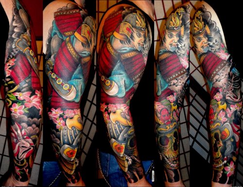 Attractive Colored Japanese Tattoo On Full Sleeve