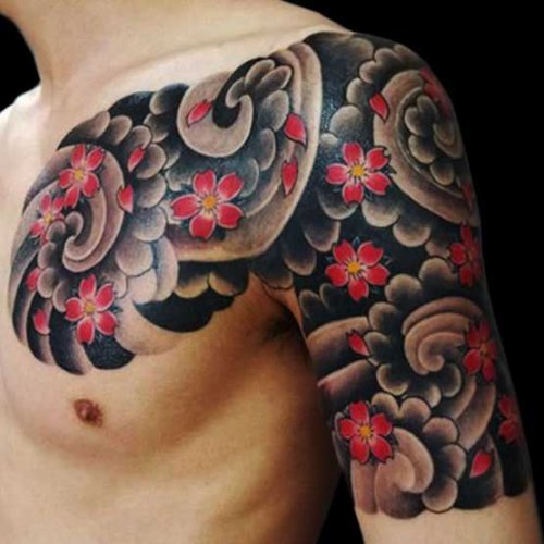 Japanese Flowers Tattoo On Chest And Half Sleeve