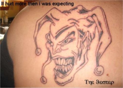 Outline Evil Jester Tattoo On Back