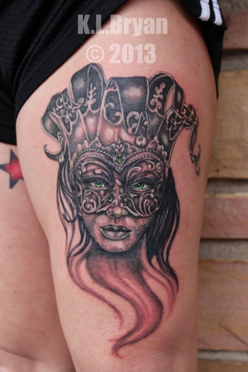 Jester Lady Face Tattoo On Thigh