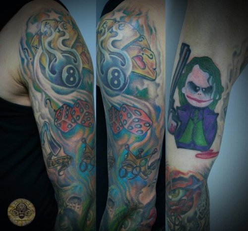Jester Tattoo On Left Sleeve