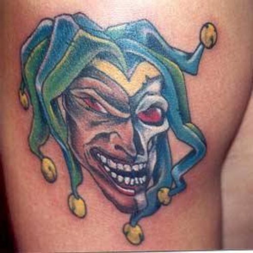 Colored Jester Tattoo On Right Shoulder