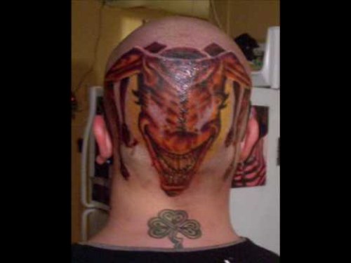 Jester Tattoo On Man Back Head