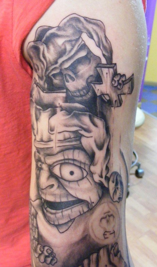 Half Sleeve Grey Ink Jester Tattoo