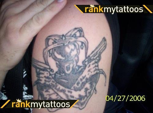 Jester Tattoo On Left Shoulder